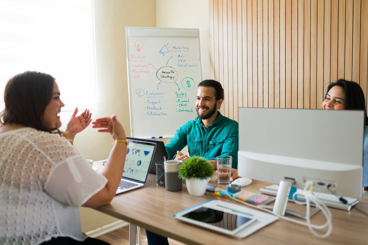 Diverse marketing team discussing business promotion strategy